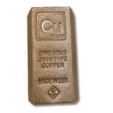 A one kilo fine copper bar, made of copper, featuring the periodic table symbol 'Cu' and 'ONE KGO .9995 FINE COPPER' embossed on its front face, set against a plain white background.